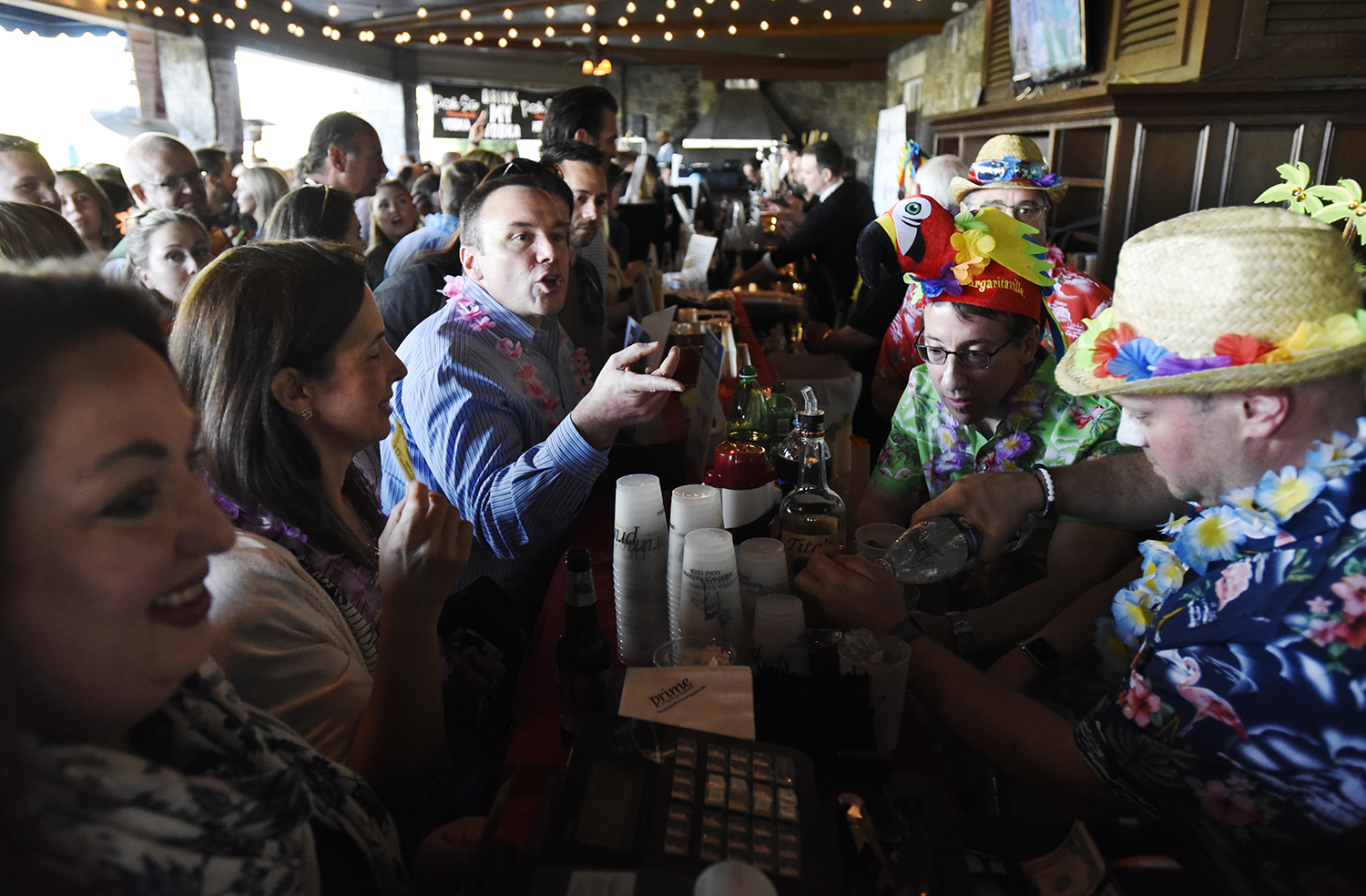 Supporters fill the bar and patio at Prime at Saratoga National Golf Course for Shaken & Stirred, a fundraised for UPH May 16, 2019.