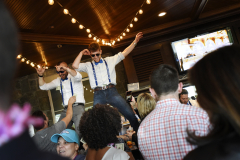 Supporters fill the bar and patio at Prime at Saratoga National Golf Course for Shaken & Stirred, a fundraised for UPH May 16, 2019.