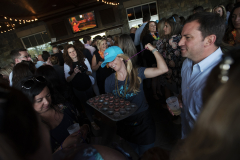 Supporters fill the bar and patio at Prime at Saratoga National Golf Course for Shaken & Stirred, a fundraised for UPH May 16, 2019.