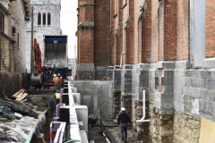 Construction crews work on the exterior where the glass atrium will be built at Universal Preservation Hall in Saratoga Tuesday, April 9, 2019.