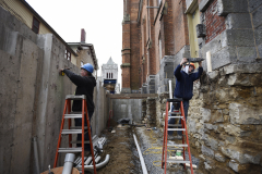 Construction crews work on the exterior where the glass atrium will be built at Universal Preservation Hall in Saratoga Tuesday, April 9, 2019.